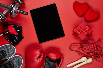 Sport equipment and red hearts. Fitness.