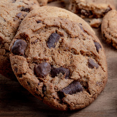Chocolate chip cookies  on rustic wooden background