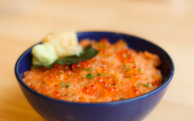 Japanese rice with Salmon and Tobiko, selective focus.