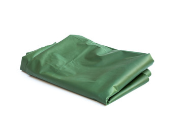 folded green plastic sheet on white background