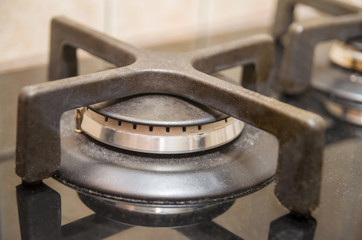 Obraz na płótnie Canvas Burners metal gas hob surface plates are shot close-up