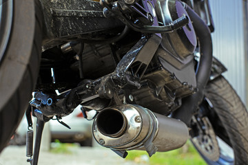 Fototapeta premium Cropped close up shot of beautiful and custom made motorcycle in the workshop