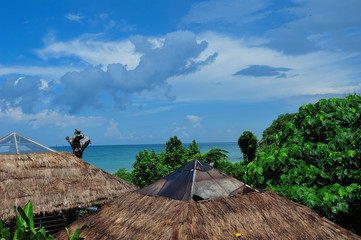 Blue sky with bungalows