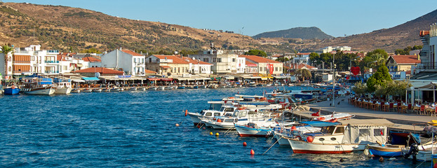 Izmir/Turkey - Foca / Fokai Bay with fishing boats on sunny day. - obrazy, fototapety, plakaty