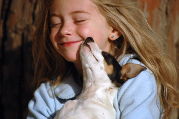 Little girl with puppy