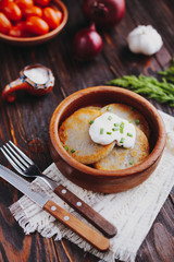Potato pancakes with sour cream