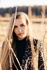Portrait of Beauty Romantic Girl Outdoors. on the Field in Sun Light. Long Hair. Autumn.