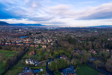 aerial view of  Autumn countryside to the city during  sunset time, Northern Ireland