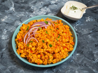 Turkish bulgur pilaf with chickpeas and tomatoes
