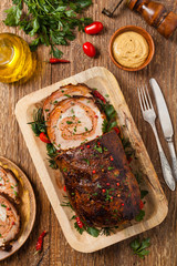 Roasted whole, stuffed with minced pork neck.