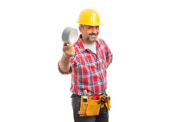 Builder presenting duct tape .