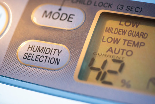Air Purifier and dehumidifier. Concept for dehumidifying room. Humidity selection button. Humidity percentage display.