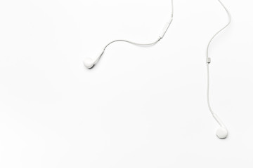 white Earphones isolated on white background