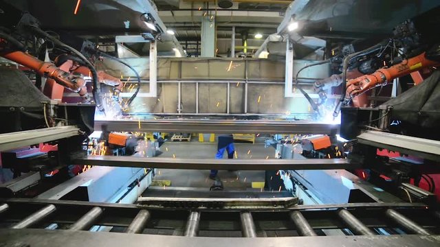 Welding robot, the process of welding a metal profile.