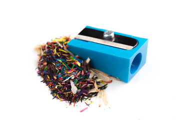 Pencil sharpener and wood shavings isolated on white - Image.
