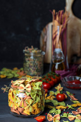 Mixed colorful farfalle pasta with vegetable mashed