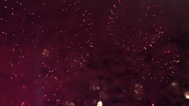 Fireworks show in the night sky, recording under the fireworks. 