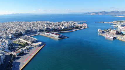 Fototapeta na wymiar Aerial drone photo of crowded port of Piraeus, one of the most large in Europe, where boats and cruise ships travel to popular Aegean destinations