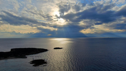 Fototapeta na wymiar Aerial drone photo of beautiful sunset over the Aegean sea and Greek islands, Greece
