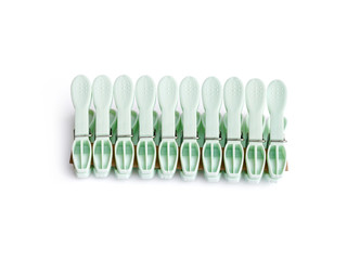 Fototapeta premium Set of ten clothespins isolated on white background with clipping path