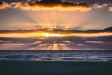 Sunset Rays Over Ocean