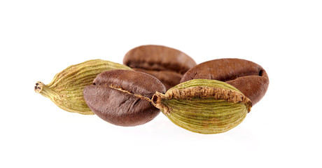 Coffee beans with cardamon isolated on white background