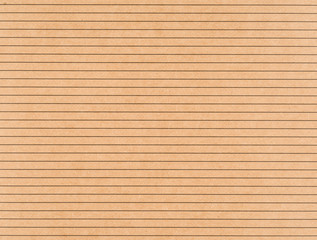 Brown craft paper with a black horizontal lines