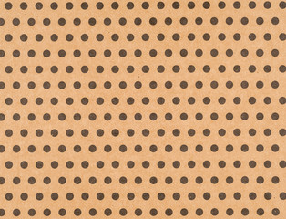 Brown craft paper with a polka dot pattern