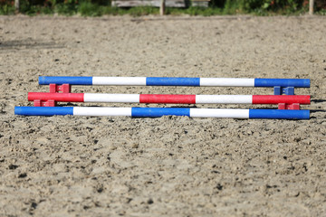 Colorful photo of equestrian obstacles. Empty field for horse jumping event competition