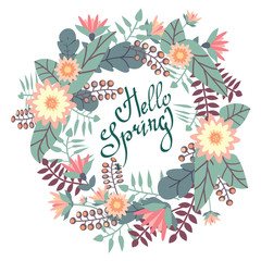 Greeting card with floral wreath and Hello Spring brash pen lettering.