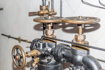 Control valves in an old subway machine room