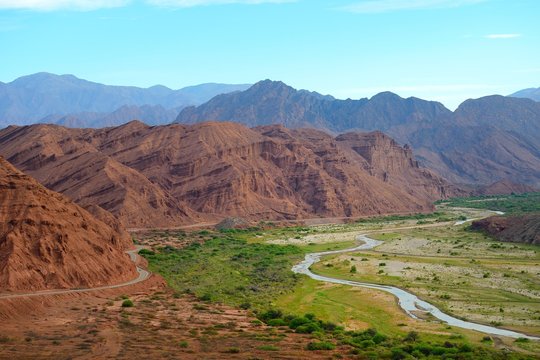 View over river landscape, red mountains, river Rio de las Conchas, gorge Quebrada de las Conchas, near Cafayate, province of Salta, Argentina, South America