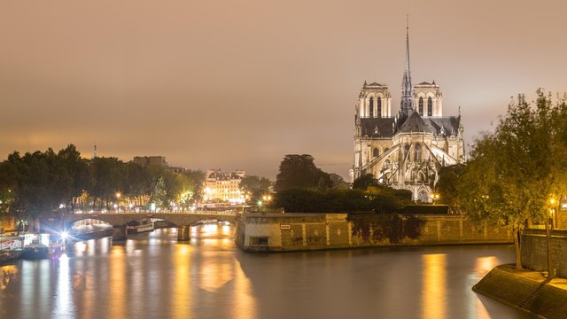 Notre Dame with river Seine, night view, Ile de la Cite, Paris, France, Europe