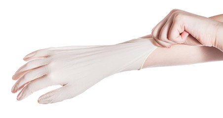 above view of hand wears latex glove on hand