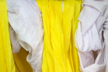 yellow and white fabric