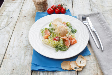 salad with salmon and fresh vegetables