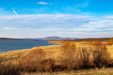 landscape with lake and blue sky