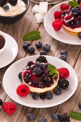 Cheesecakes with mixed berries.