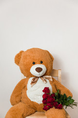 Big Teddy Bear holding red rose bouquet, romantic gift surprise, Valentines day, anniversary,love