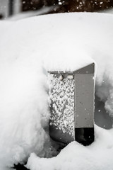 Snow Covered Mailbox. Winter snow caps a mailbox. Snow chaos and catastrophe alert in Bavaria south Germany Winter 2019