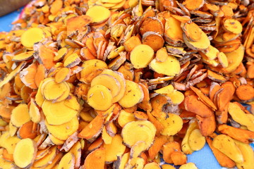 farmer practice cut slice of Zingiber,Turmeric root, Cassumunar ginger, Bengal root,Zingiberaceae, turmeric for drying.The local food and Thai herb in Thailand.