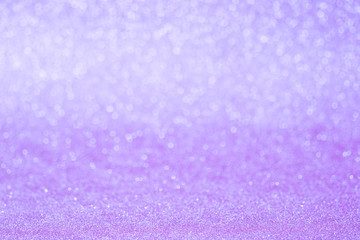 Glitter christmas abstract background. Winter christmas bokeh lights defocused.