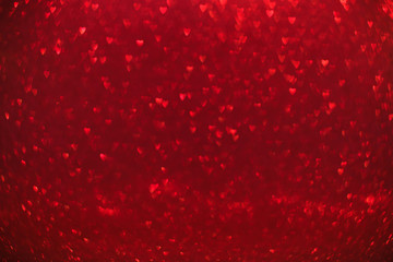 Red heart glitter bokeh background. Valentine's Day background.