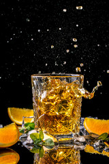 Elite alcoholic drink closeup. Two cognac portions in glass on black background, menu photo, copy...