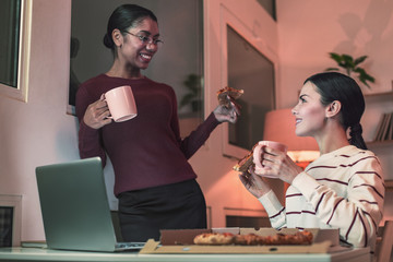 Cheerful colleagues spending pause with pleasure