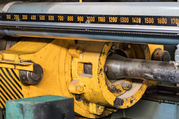 Detail of the short stroke of an aluminium extrusion press.