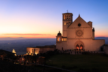 assisi is a city in Umbria, in Italy. It is surrounded by hills, olive groves and vineyards