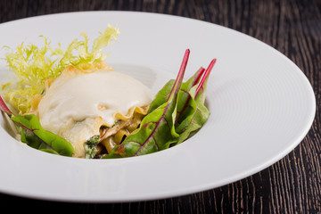 Mushroom lasagna with greens.