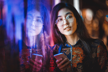 Pretty asian woman portrait with led lights