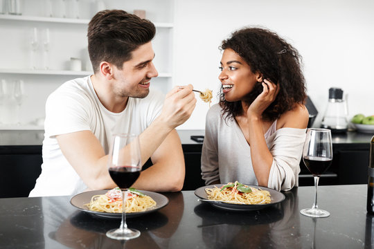 Beautiful young multiethnic couple having a romantic dinner